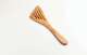 Slotted olive wood spatula, approx. 30 cm